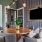 spacious wooden table with seating
