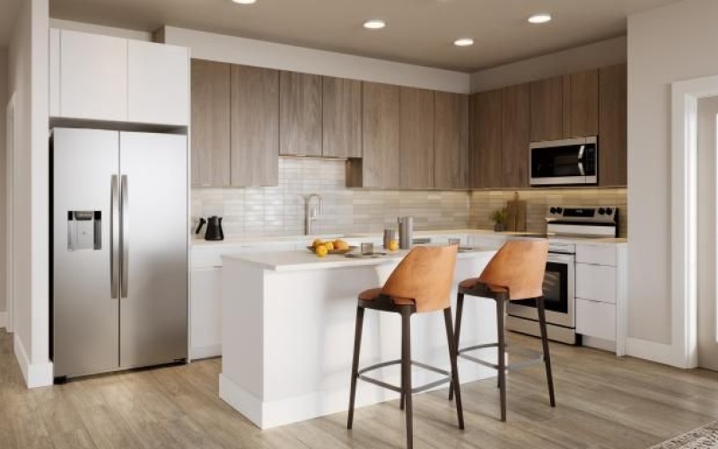 a kitchen with a white table and chairs